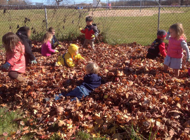 Preschool Canton Jumping In Leaves1